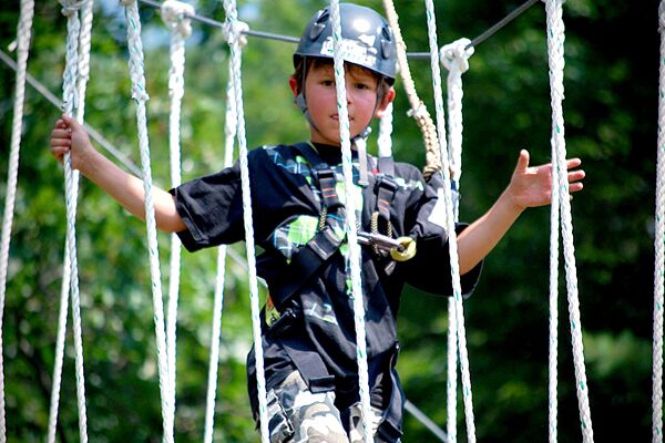 Burma Kid_preview kid walking through rope bridge