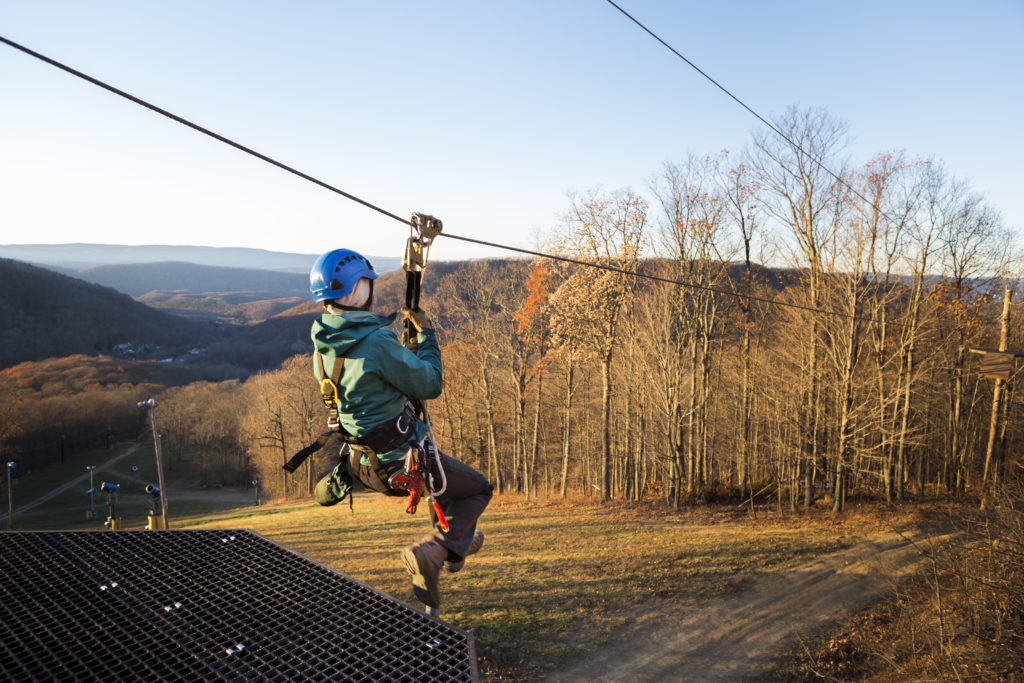 Person on a zip line.