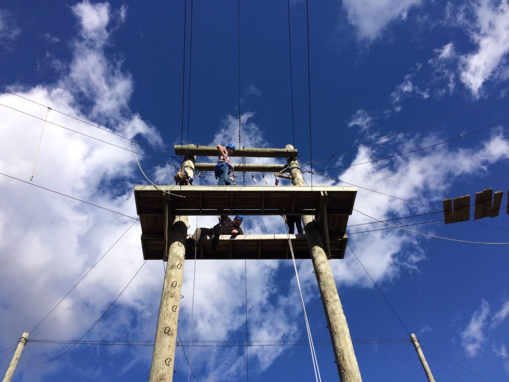 high-ropes-challenge-course-below-platform-blue-skies high-ropes-challenge-course-below-platform-blue-skies