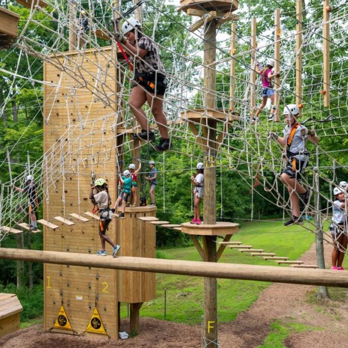 Camper's climb in the Camp Erst Double Discovery Course.