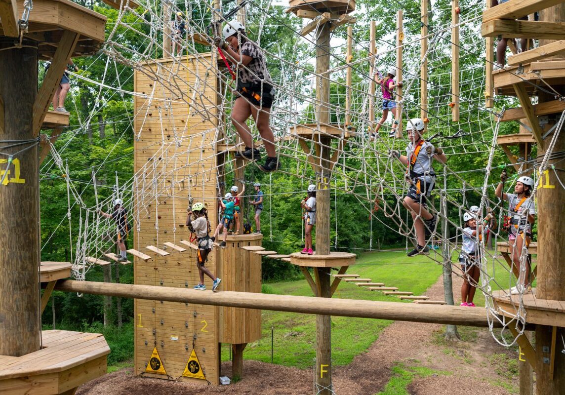 Camper's climb in the Camp Erst Double Discovery Course.